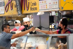Food stand inside Grand Central Market, Los Angeles, July 13, 2022.