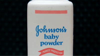 In this April 15, 2011 file photo, a bottle of Johnson's baby powder is displayed in San Francisco. Johnson & Johnson is pulling its iconic, talc-based Johnson’s Baby Powder from shelves worldwide next year in favor of a product based on cornstarch. The health care giant’s announcement Friday, Aug. 12, 2022, comes two years after it ended talc-based powder sales in the U.S. and Canada, where demand has dwindled amid thousands of lawsuits claiming it had caused cancer.