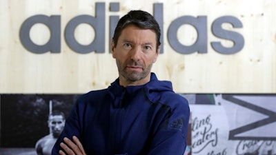 CEO of German sports equipment company adidas AG, Kasper Rorsted, poses prior to the annual balance news conference in Herzogenaurach, Germany, Wednesday, March 14, 2018. Sports apparel maker Adidas said Monday that Kasper Rorsted, its CEO since 2016, will step down next year and it has started looking for a successor.