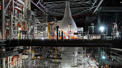 A section of the Artemis rocket with the Orion space capsule is seen inside the Vehicle Assembly Building at the Kennedy Space Center, Friday, Nov. 5, 2021, in Cape Canaveral, Fla. The Orion capsule is named after the constellation, among the night sky’s brightest. At 11 feet (3 meters) tall, it’s roomier than Apollo's capsule, seating four astronauts instead of three.