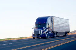 Blue Modern Semi Truck Reefer Trailer Carry Cargo On Highway 492741128 2122x1416