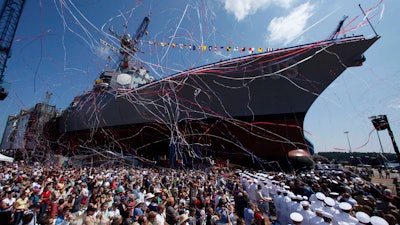 An Arleigh-Burke Class destroyer is christened at Bath Iron Works in Bath, Maine, Aug. 1, 2009. The U.S. Navy's workhorse destroyer went into production more than 30 years but will soon be replaced by a new destroyer that will feature lasers that can shoot down missiles and attack enemies with hypersonic missiles topping 3,800 mph.