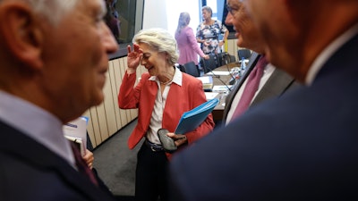 European Commission President Ursula von der Leyen gather with EU commissioners prof to a meeting at the European Parliament in Strasbourg, eastern France, Tuesday, Sept. 13, 2022.
