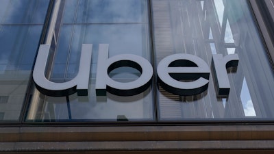 An Uber sign is displayed at the company's headquarters in San Francisco, Monday, Sept. 12, 2022.