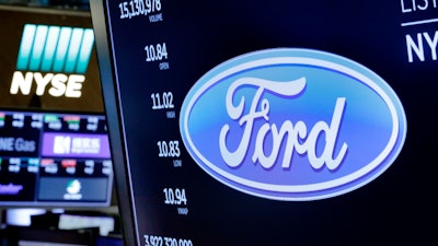 The logo for Ford appears above a trading post on the floor of the New York Stock Exchange, Monday, April 23, 2018.