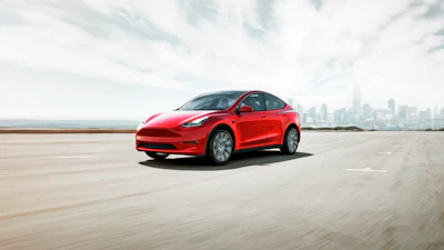 This photo provided by Tesla shows the 2022 Tesla Model Y, an all-electric SUV that has an EPA-estimated maximum range of about 330 miles.