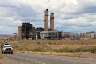 A work truck leaves the San Juan Generating Station near Waterflow, New Mexico, on Tuesday, Sept. 20, 2022.