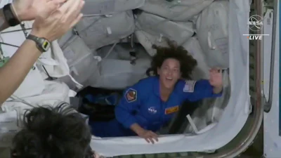 In this image from video made available by NASA, U.S. Marine Col. Nicole Mann, a member of the Wailacki of the Round Valley Indian Tribes in California, enters the International Space Station from a SpaceX Crew Dragon capsule on Thursday, Oct. 6, 2022. Her crew of four includes the first Russian to launch from the U.S., in 20 years and the first Native American woman to orbit the Earth.