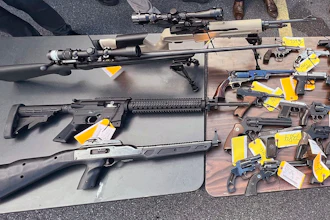 This photo, provided by the Office of New York Attorney General Letitia James, on Aug. 28, 2022 shows some of the 296 firearms, including 177 ghost guns, that were surrendered to law enforcement at a gun buy-back event hosted by her office and the Utica, NY, Police Department.