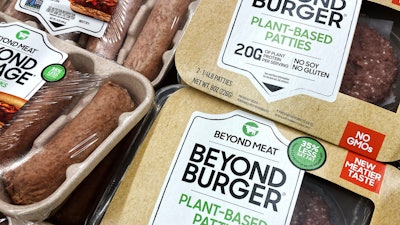 Beyond Meat products are seen in a refrigerated case inside a grocery store in Mount Prospect, Ill., Saturday, Feb. 19, 2022.