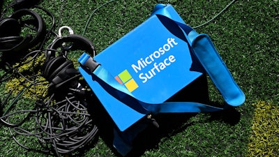 Microsoft Surface equipment lies on the turf before an NFL football game between the Atlanta Falcons and the Cleveland Browns, Sunday, Oct. 2, 2022, in Atlanta. Microsoft earnings are reported on Tuesday, Oct. 25, 2022.