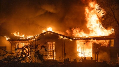 A house burns on Platina Road at the Zogg Fire near Ono, Calif., on Sep. 27, 2020.