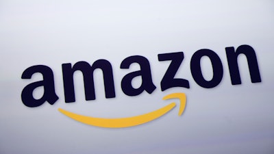 The Amazon logo is displayed at a news conference in New York on Sept. 28, 2011.