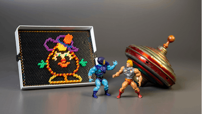 This undated photo provided by The Strong Museum shows the three toys inducted into the National Toy Hall of Fame on Nov. 10, 2022, in Rochester, N.Y. Masters of the Universe, Lite-Brite and the top were chosen from among 12 finalists for the annual honor, which recognizes toys that have inspired creative play and lasting popularity.