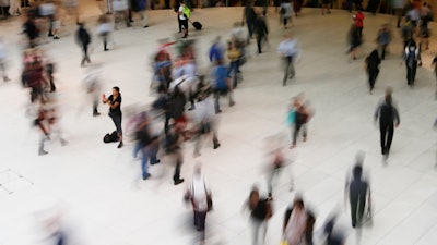 In this June 15, 2017 photo, people walk inside the Oculus in New York. Google has agreed to a $391.5 million settlement with 40 states in connection with an investigation into how the company tracked users’ locations.