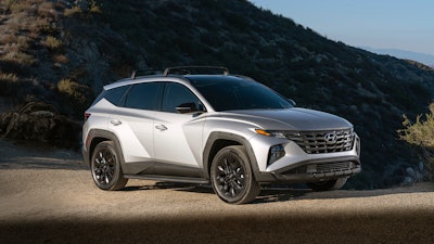 This photo provided by Hyundai shows the 2022 Hyundai Tucson, a small plug-in hybrid SUV with an electric range of about 33 miles and a combined fuel economy rating of 35 mpg.