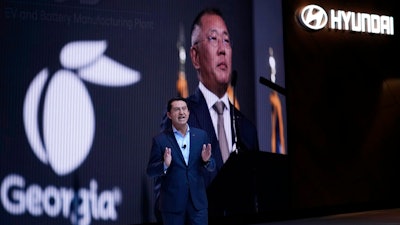José Muñoz, global president and COO of Hyundai Motor Company and the president and CEO of Hyundai and Genesis Motor North America, speaks at the AutoMobility LA Auto Show Thursday, Nov. 17, 2022, in Los Angeles.