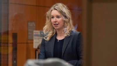 Former Theranos CEO Elizabeth Holmes arrives at federal court in San Jose, Calif., on Oct. 17, 2022.