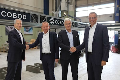 From left to right: Simon Wiedemann, Head of Solutions and Products, Holcim; Henrik Lund-Nielsen, Founder and General Manager in COBOD; Edelio Bermejo, Group Head of R&D and IP; Lars Bugge, Chairman in COBOD International.