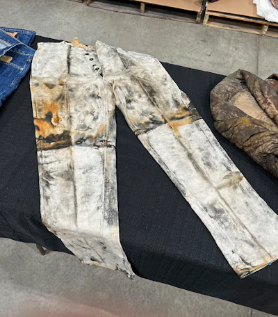 In this undated photo provided by Holabird Western Americana Collections are miner's work pants with a five-button fly, recovered from the 1857 sinking of the S.S. Central America, that may have been made by or for Levi Strauss during the California Gold Rush-era.