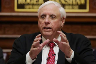 West Virginia Gov. Jim Justice delivers his annual State of the State address in the House Chambers at the state Capitol in Charleston, W.Va., Jan. 8, 2020.