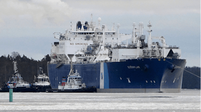 Tugboats steer the vessel FSRU Exemplar, the floating liquefied natural gas (LNG) terminal chartered by Finland to replace Russian gas, as it arrives to the Inkoo port, west of Helsinki, Wednesday Dec. 28, 2022. Finland has agreed a 10-year charter for the Exemplar floating storage and regasification unit (FSRU) that will serve both its domestic and the Baltic market, providing additional resources as Europe grapples with an energy crisis.