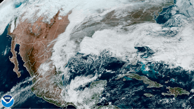 This satellite image made available by NOAA shows cloud cover over North America on Wednesday, Dec. 21, 2022 at 1:31 p.m.