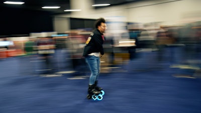 Mohamed Soliman of Atmos Gear shows off the Atmos Gear inline electric skates during CES Unveiled before the start of the CES tech show, Tuesday, Jan. 3, 2023, in Las Vegas.