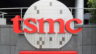 Taiwan Semiconductor Manufacturing Co., Ltd. (TSMC) logo brands the headquarters in Hsinchu, Taiwan, Wednesday, Oct. 20, 2021.