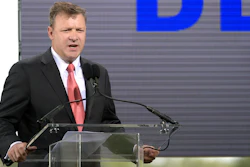 Florida Power and Light President and CEO Eric Silagy addresses reporters and guests during a news conference unveiling the new Blue Origin rocket at the Cape Canaveral Air Force Station in Cape Canaveral, Fla., Sept. 15, 2015.