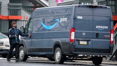 An Amazon Prime driver makes a delivery in Pittsburgh on Monday, Jan. 23, 2023. On Wednesday, the Labor Department reports on job openings and labor turnover for December.