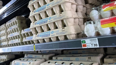 Eggs are displayed on store shelves at a local grocery store in Chandler, Ariz., Jan. 21, 2023.