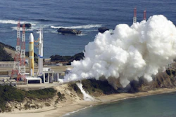 An H3 rocket sits on the launch pad next to billowing white smoke at Tanegashima Space Center in Kagoshima, southern Japan Friday, Feb. 17, 2023.
