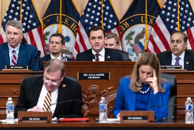 Chairman Mike Gallagher, R-Wis., center, leads the GOP's newly-formed House Select Committee on the Strategic Competition Between the United States and the Chinese Communist Party, as the panel adopts its rules ahead of a primetime hearing later tonight, at the Capitol in Washington, Tuesday, Feb. 28, 2023. He is flanked by Rep. Rob Wittman, Va., left, and Rep. Raja Krishnamoorthi, D-Ill., the ranking member, right.