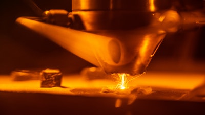 3D-printing technologies like Laser Engineered Net Shaping, shown here, are helping scientists at Sandia National Laboratories rapidly discover, prototype and test new materials.