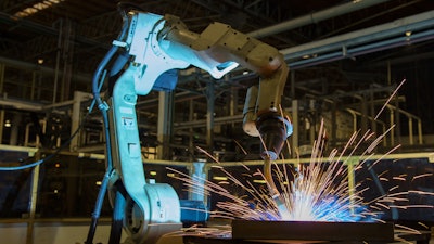 Robot Welding In An Auto Factory