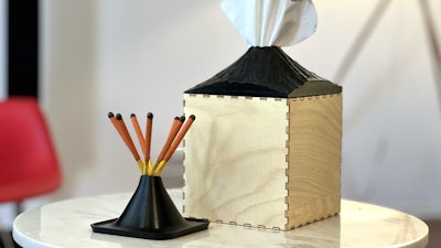 A volcano-themed tissue box designed with the help of AI-assisted image generation.