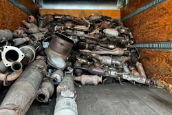 This photo provided by the Phoenix Police Department shows stolen catalytic converters that were recovered after detectives served a search warrant at a storage unit in Phoenix, May 27, 2022.