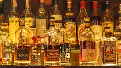 A collection of bottles of Pappy Van Winkle bourbons are seen on the top shelf right, among other fine whiskies at the 'Far Bar,' located in the historic Far East Building in the heart of Little Tokyo in Los Angeles on Saturday, March 4, 2023.