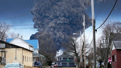 A black plume rises over East Palestine, Ohio, Feb. 6, 2023