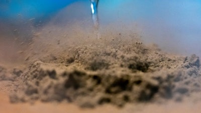 Cryoclastic flow caused by liquid nitrogen poured on lunar dust simulant.