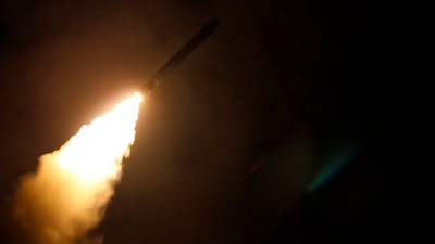In this image provided by the U.S. Navy, the guided-missile destroyer USS Laboon (DDG 58) fires a Tomahawk land attack missile on April 14, 2018, as part of the military response to Syria's use of chemical weapons on April 7.