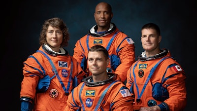 This photo provided by NASA shows, from left, NASA Astronauts Christina Koch, Victor Glover, Reid Wiseman, and Canadian Space Agency Astronaut Jeremy Hansen at the Johnson Space Center in Houston on March 29, 2023.