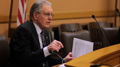 State Sen. Mike Thompson, R-Shawnee, speaks to fellow GOP senators during a caucus meeting Thursday, April 6, 2023, at the Statehouse in Topeka, Kan.