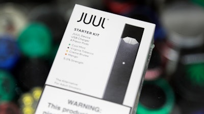 A Juul electronic cigarette starter kit is seen at a smoke shop on Dec. 20, 2018, in New York.