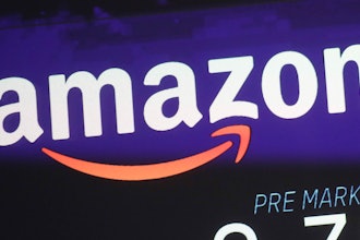 The price of Amazon stock is shown on a screen at the Nasdaq MarketSite, New York, Dec. 20, 2017.