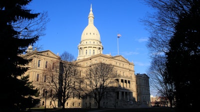 The state Capitol building stands on Dec. 12, 2012, in Lansing, Mich. A Michigan Senate committee gave final legislative approval Thursday, April 20, 2023, to allocate $175 million in state funds to a factory planned by Chinese manufacturer Gotion in northern Michigan that proponents say will create thousands of jobs and be a boon for the local economy.