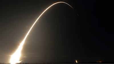 This time exposure photo shows a SpaceX Falcon 9 rocket, with a payload including two lunar rovers from Japan and the United Arab Emirates, launching from Launch Complex 40 at the Cape Canaveral Space Force Station in Cape Canaveral, Fla., on Dec. 11, 2022.