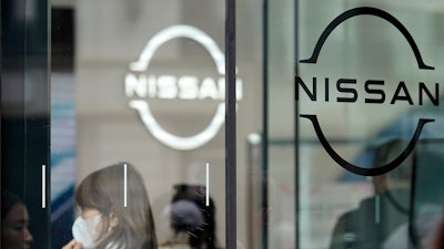 Logos at a Nissan showroom are seen in Ginza shopping district in Tokyo on March 31, 2023.