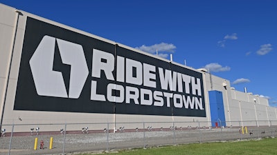 A mural is displayed on the wall outside the Lordstown Motors plant, June 22, 2021 in Lordstown, Ohio.